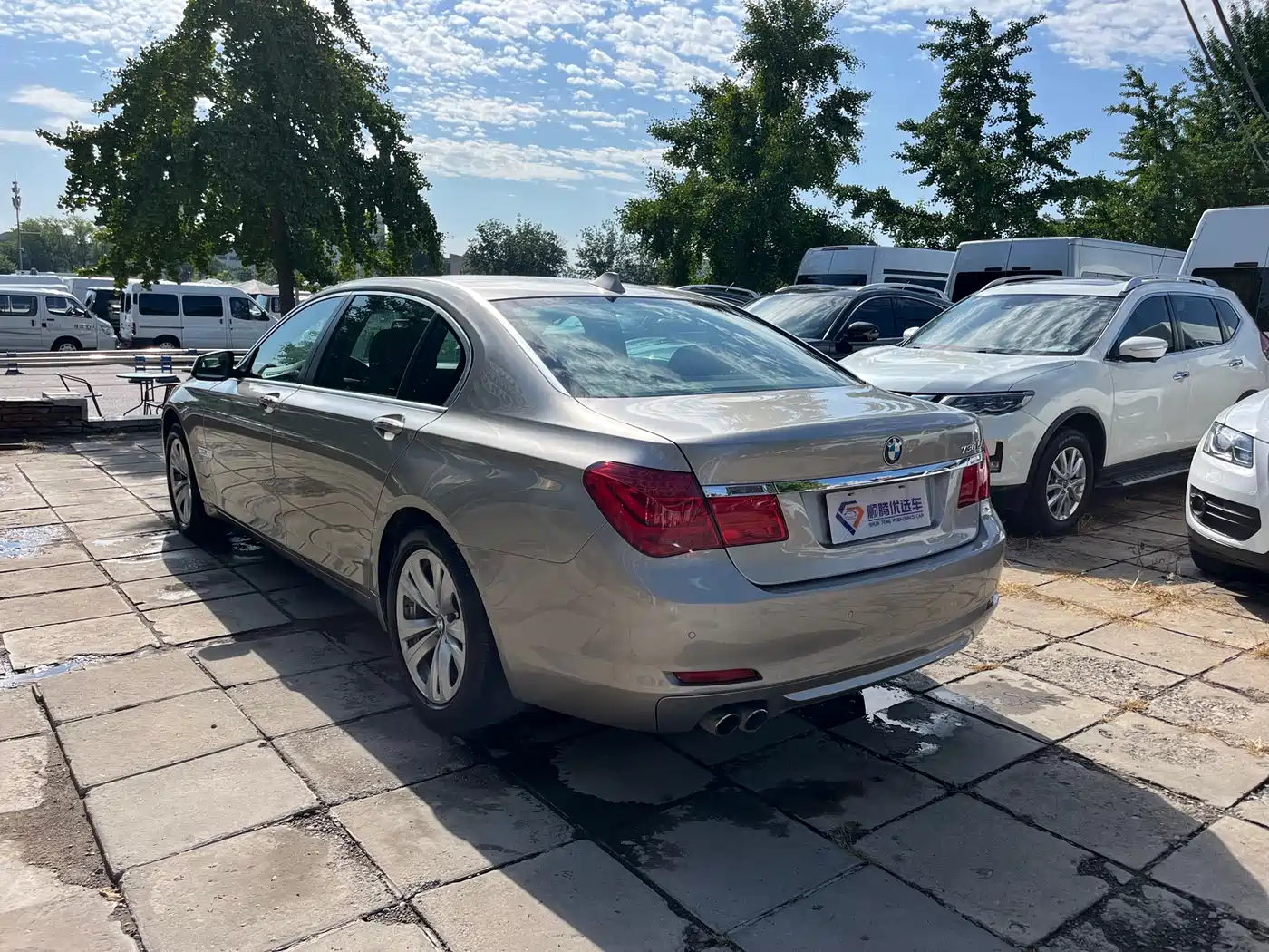 BMW 7 Series 2009 730Li Leading фото 6