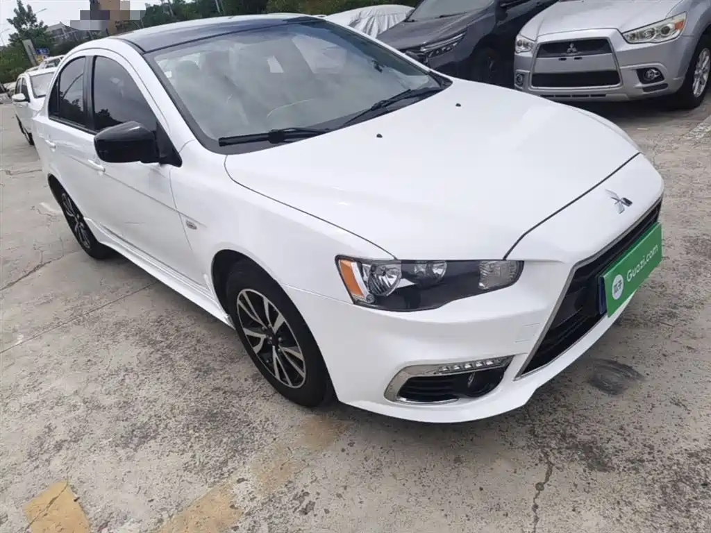 Mitsubishi Lancer EX 2016 1.8L CVT Black & White Replica фото 4