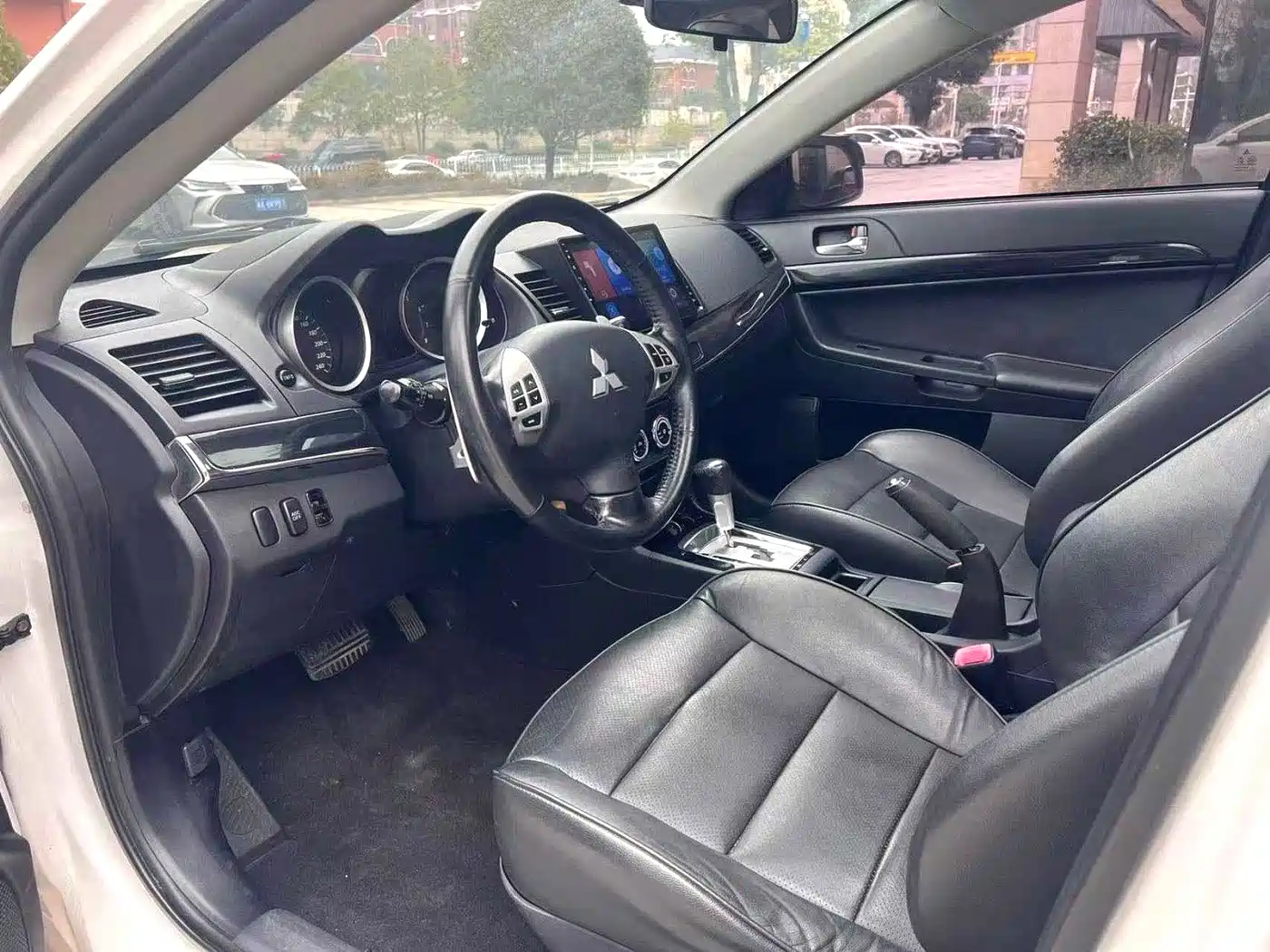 Mitsubishi Lancer EX 2013 ZhiShang Edition 1.8L CVT Luxury фото 3