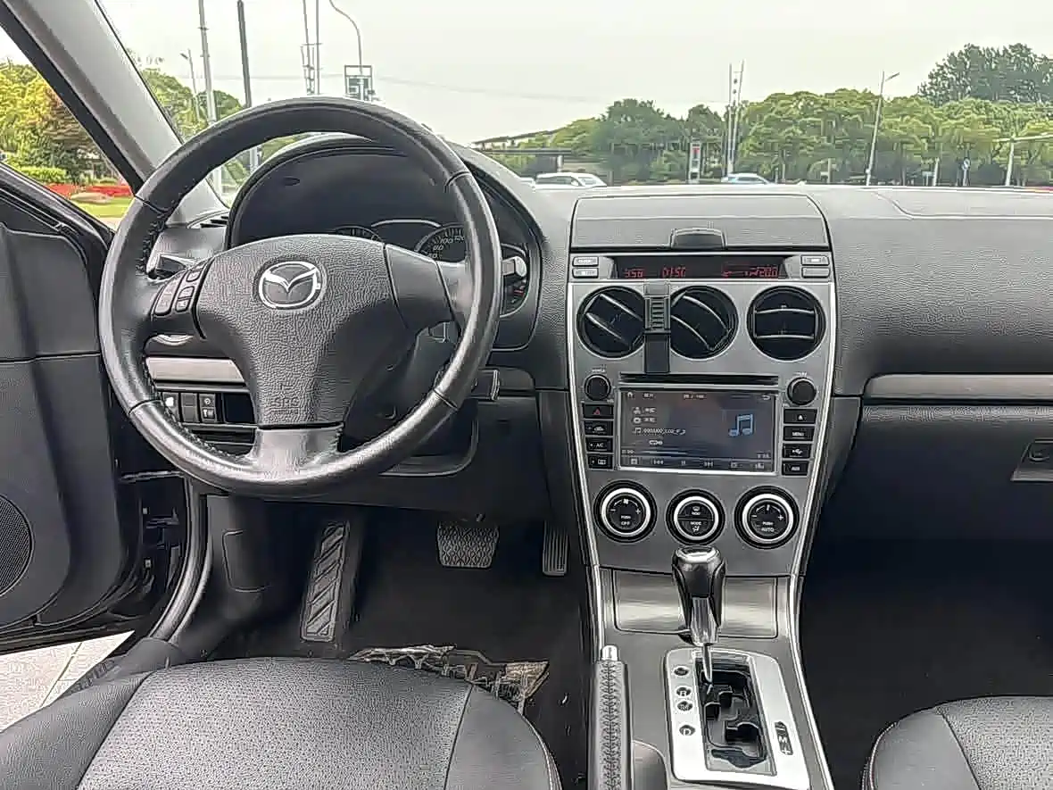 Фото 14 - Mazda 6