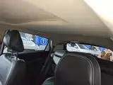 Фото 18 - Geely Vision X3