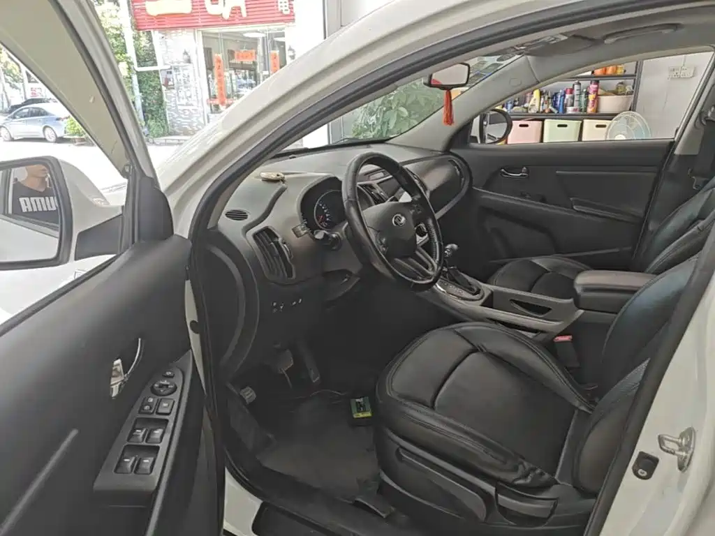 Фото 15 - Kia Sportage