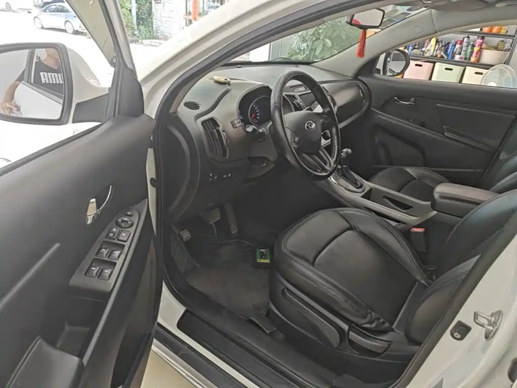 Фото 16 - Kia Sportage