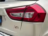 Фото 12 - Geely Vision X3