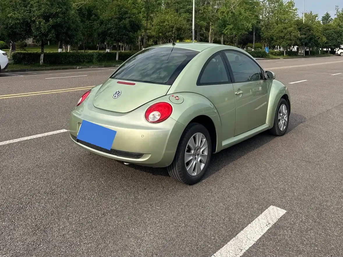 Volkswagen Beetle 2010 Model 2.0 BlackOrange Luxury Edition фото 4