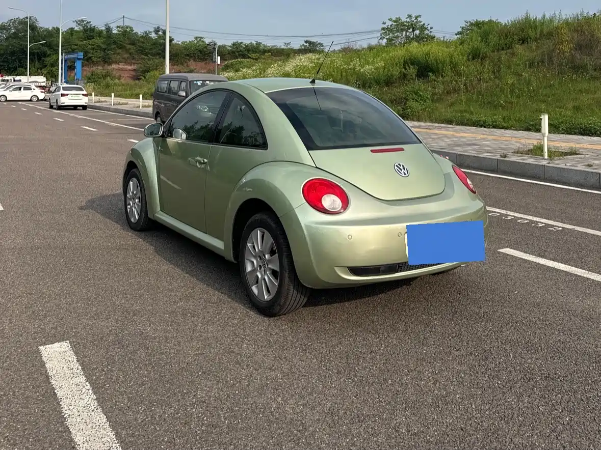 Volkswagen Beetle 2010 Model 2.0 BlackOrange Luxury Edition фото 6