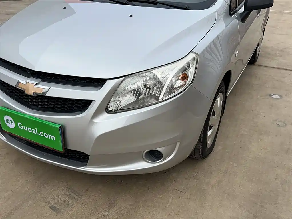 Chevrolet Sail 2013 Sedan 1.4L Manual Ideal Happiness Edition фото 3