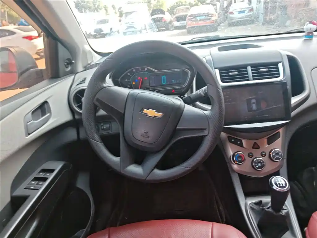 Chevrolet Aveo 2014 Hatchback 1.4SL MT Comfort Edition фото 11
