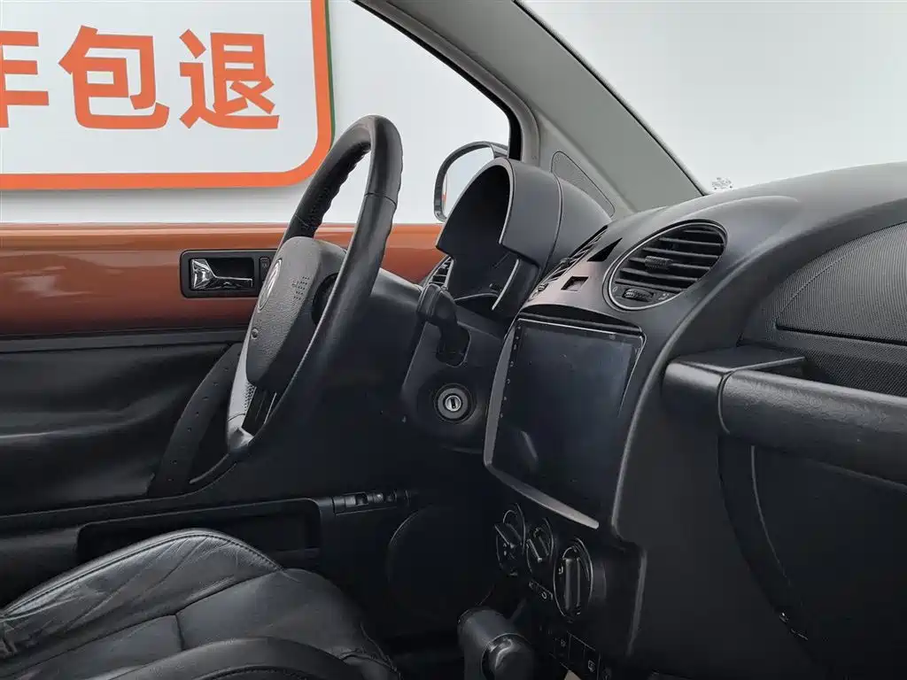 Volkswagen Beetle 2010 1.8T BlackOrange Luxury Edition фото 22