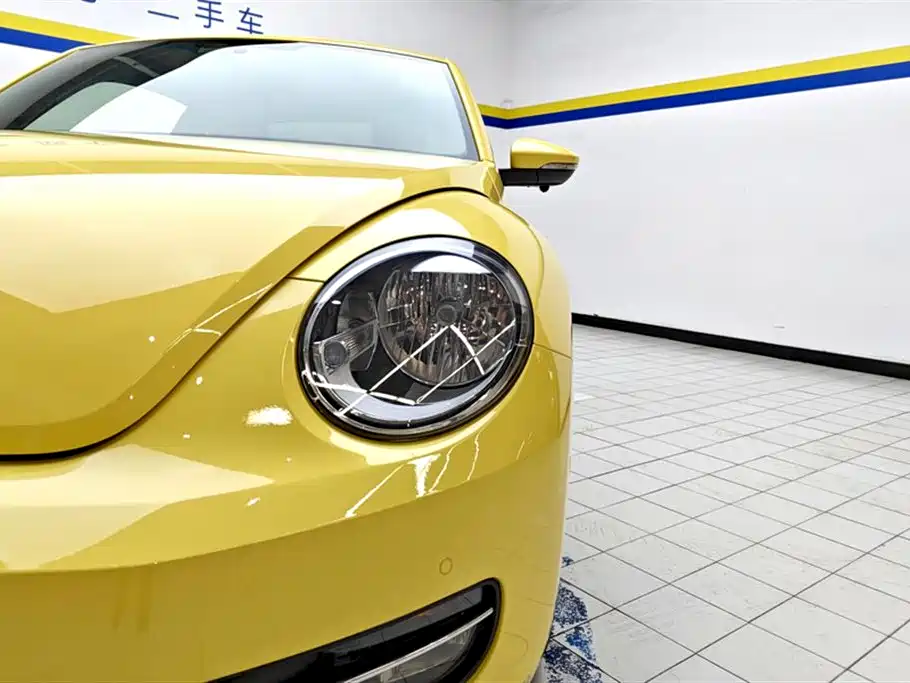 Volkswagen Beetle 2014 1.2TSI Fashion Edition фото 5