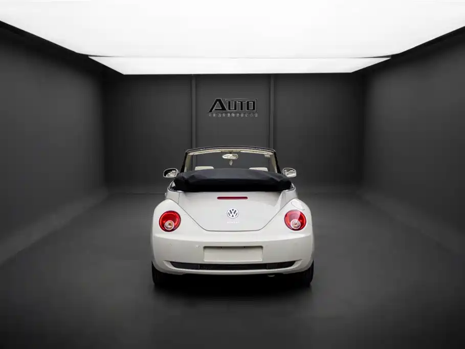 Volkswagen Beetle 2009 2.0 AT Top Convertible фото 5