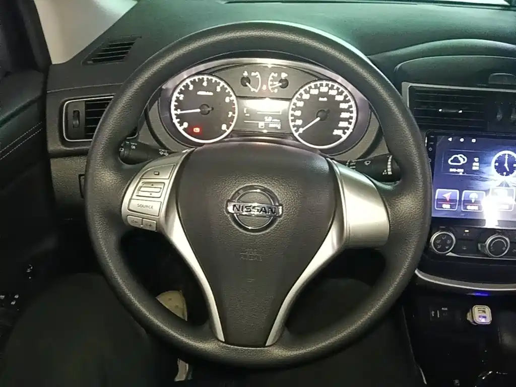 Фото 11 - Nissan Tiida