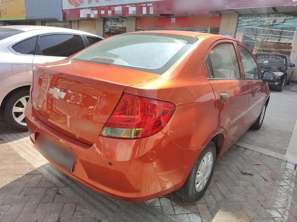 Chevrolet Sail 2013 Sedan 1.2L Manual Fashion Happiness Edition фото 7