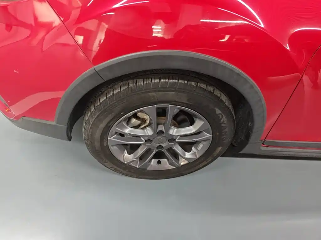 Фото 23 - Geely Vision X3