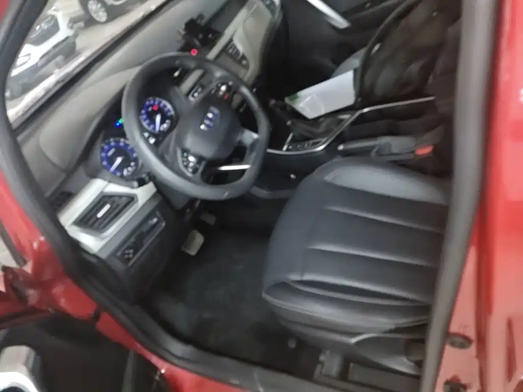 Фото 15 - Geely Vision X3