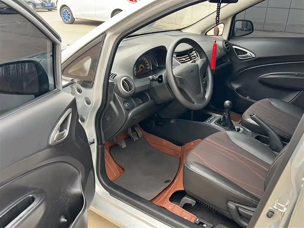 Chevrolet Sail 2013 Sedan 1.4L Manual Ideal Happiness Edition фото 21