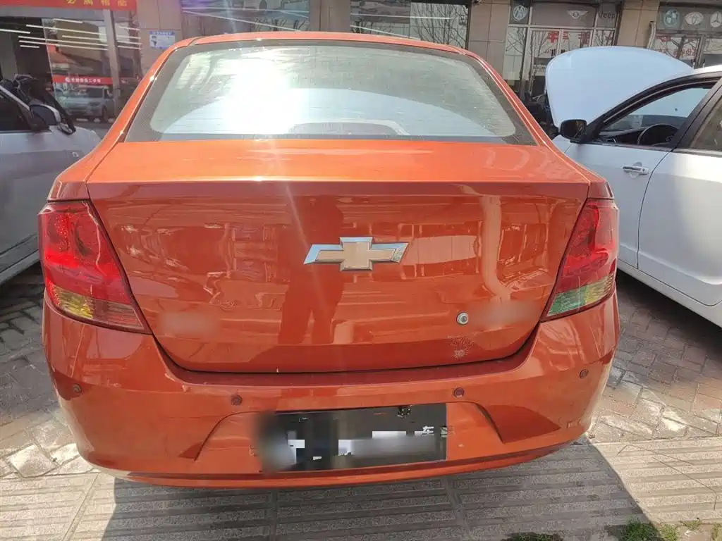 Chevrolet Sail 2013 Sedan 1.2L Manual Fashion Happiness Edition фото 6