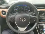 Фото 11 - Toyota Corolla Twin Engine E+