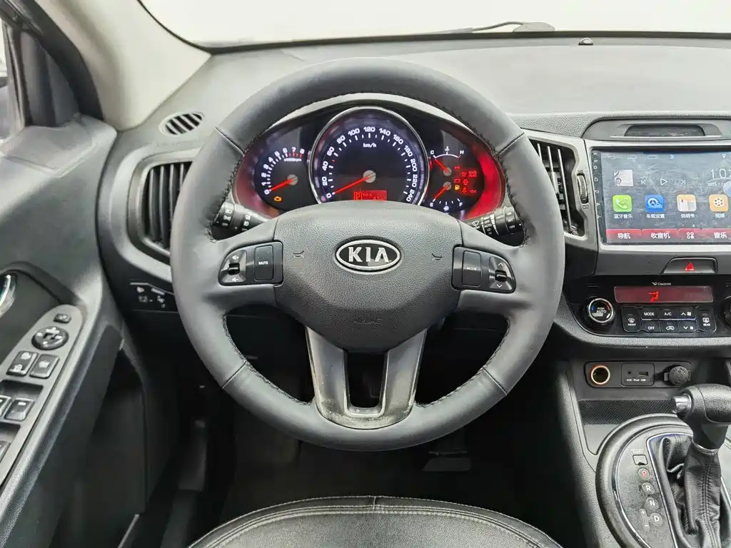 Фото 11 - Kia Sportage