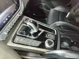 Фото 14 - Geely Atlas