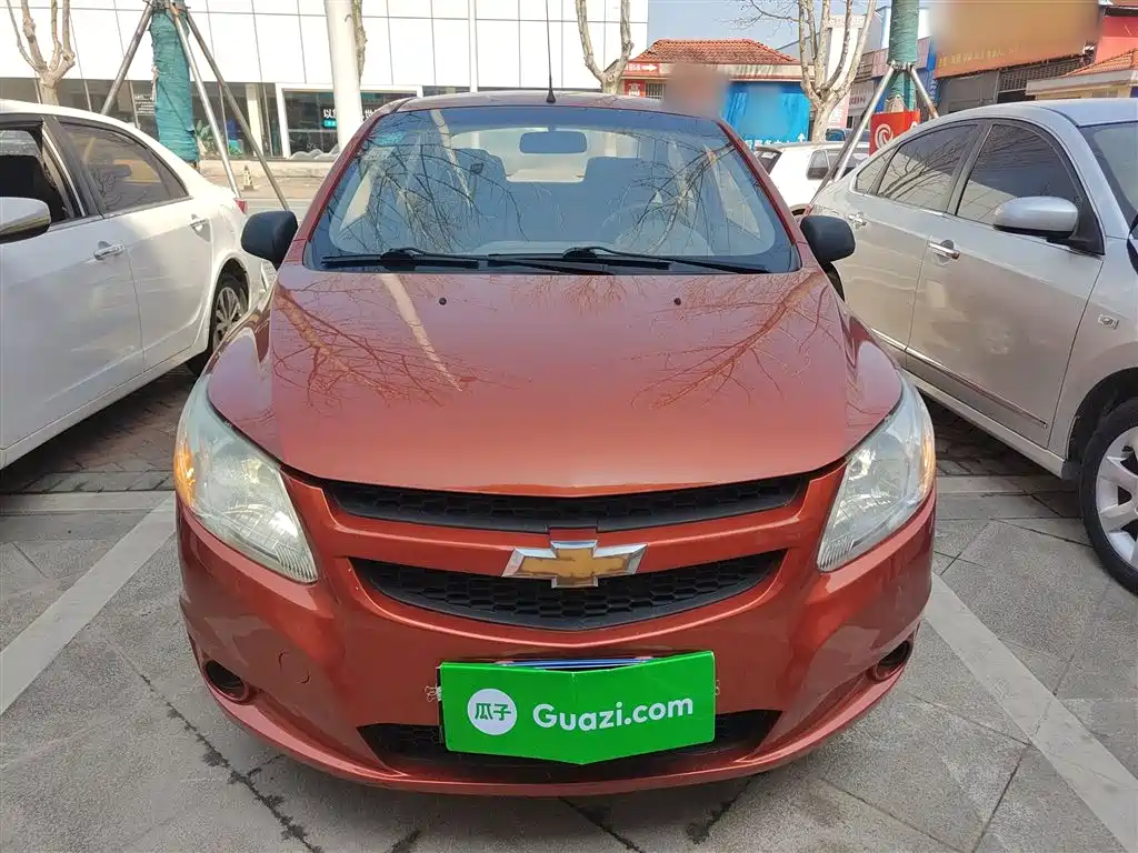 Chevrolet Sail 2013 Sedan 1.2L Manual Fashion Happiness Edition фото 3