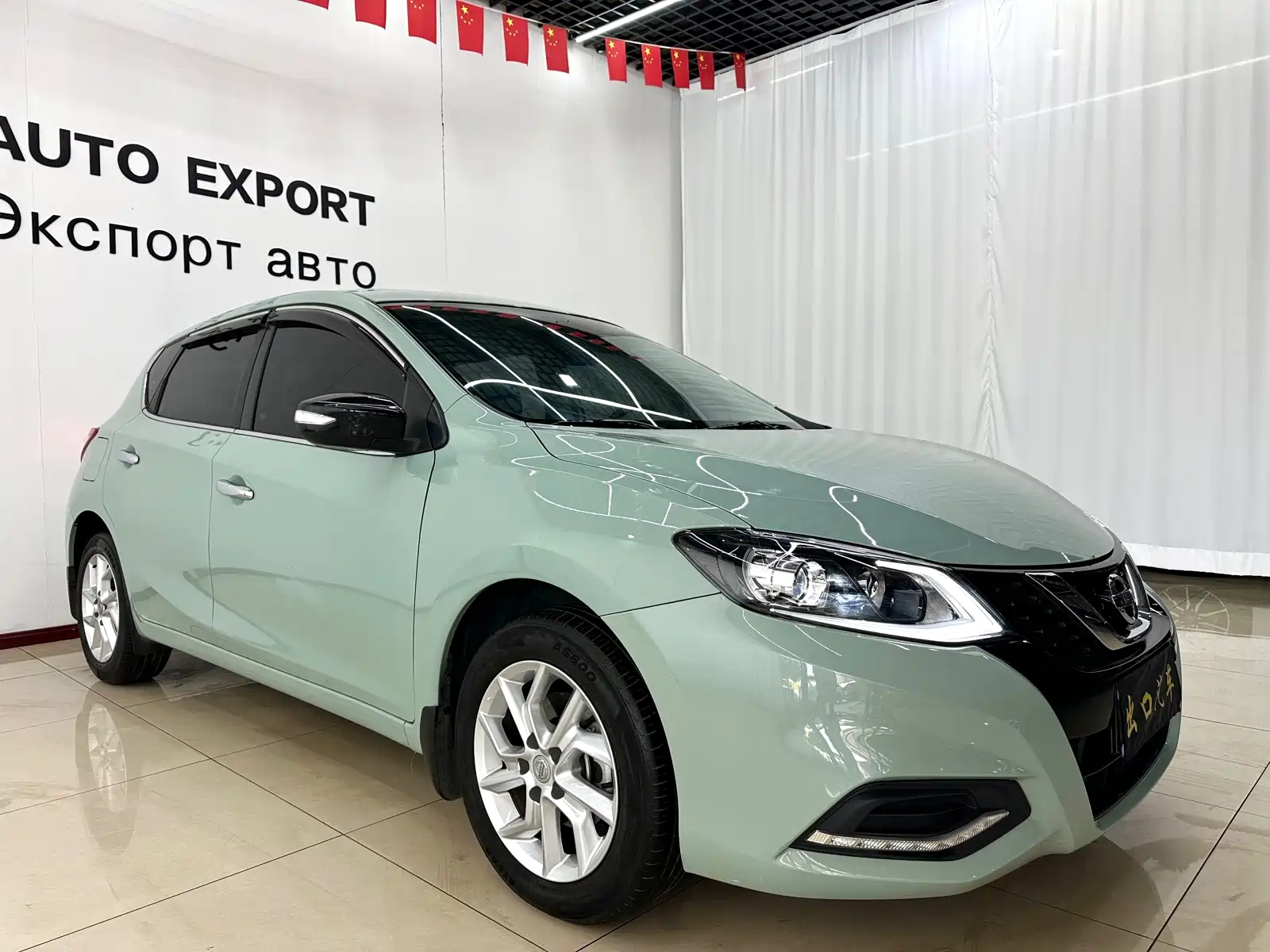 Фото 3 - Nissan Tiida