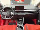 Фото 14 - Geely Vision X3
