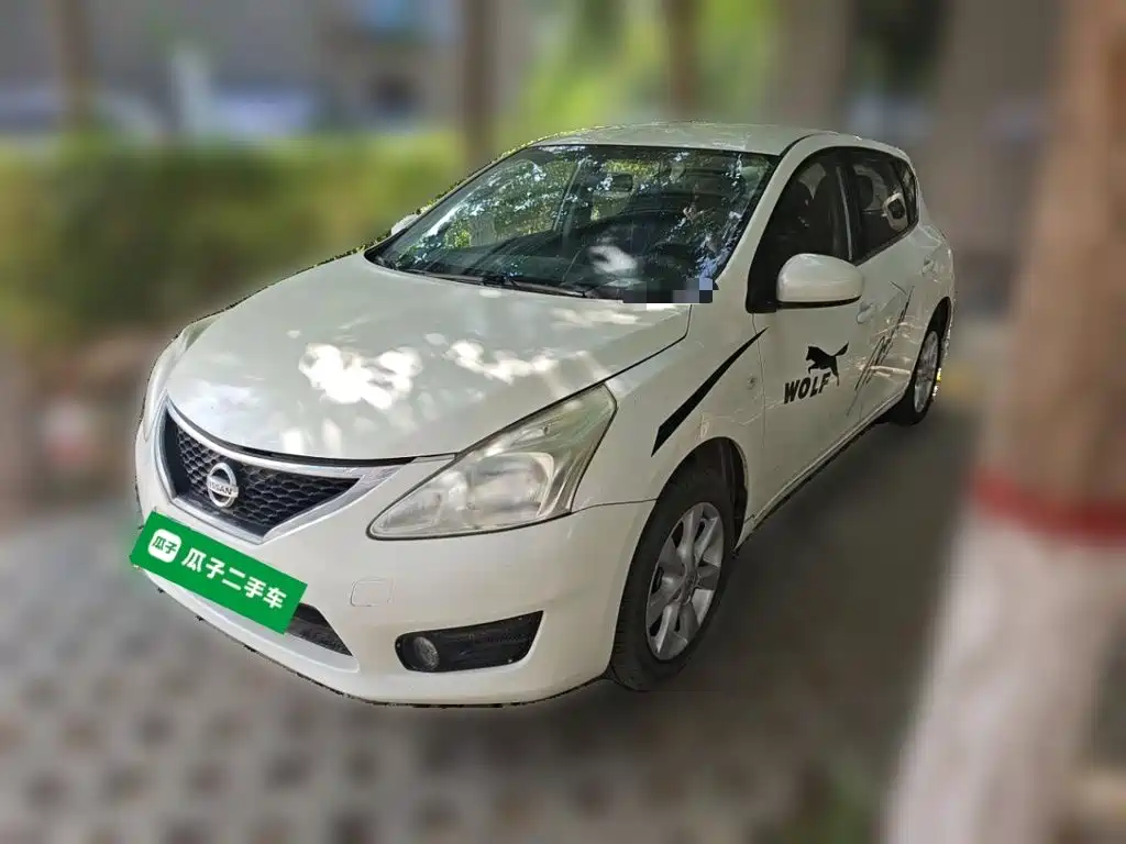 Фото 1 - Nissan Tiida