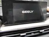 Фото 13 - Geely Vision X3