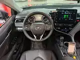 Фото 11 - Toyota Camry