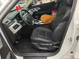 Фото 15 - Geely Atlas