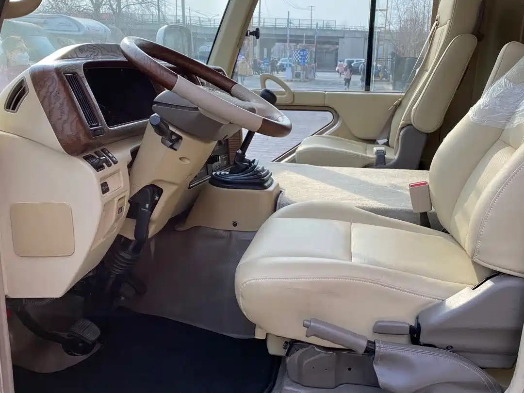 Toyota Coaster 2019 4.0L Premium Vehicle GRB53L-ZCMSK 20-seater Special Edition 9GR фото 4