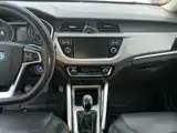 Фото 13 - Geely Vision X3
