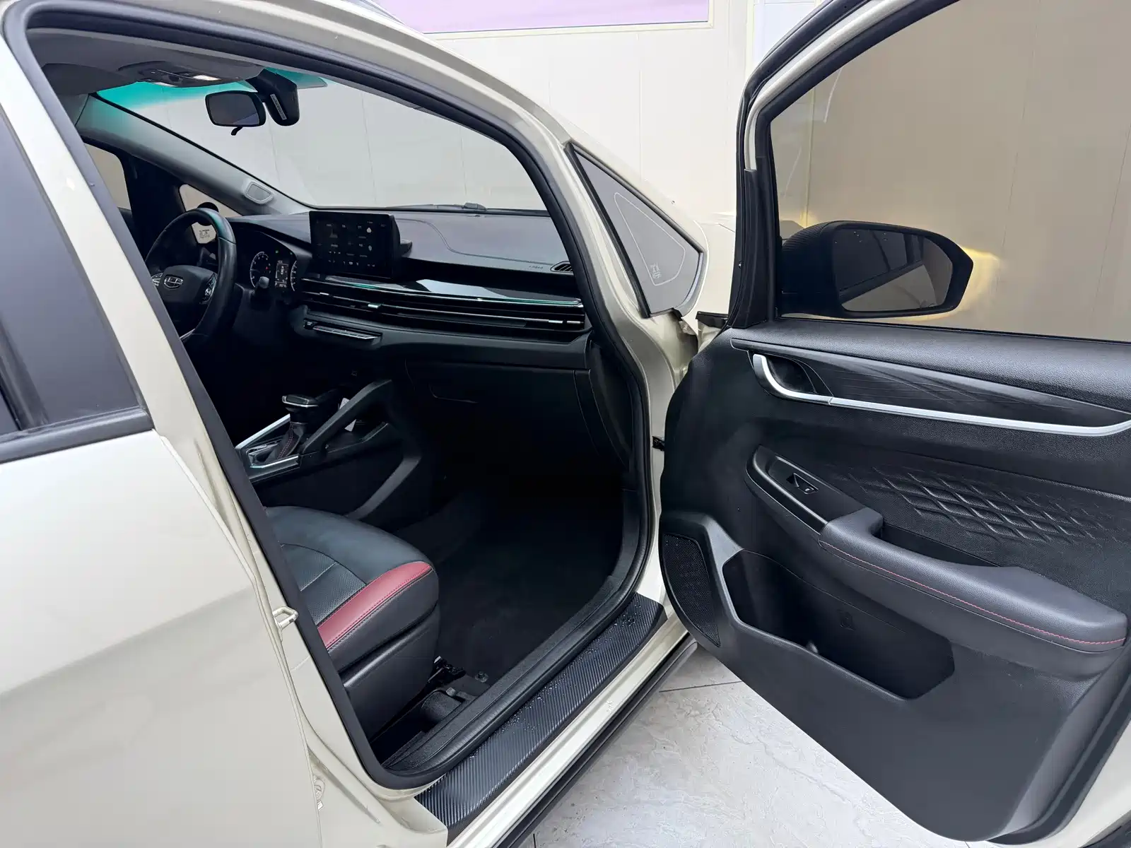 Фото 20 - Geely Vision X3