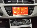 Фото 13 - Geely Atlas