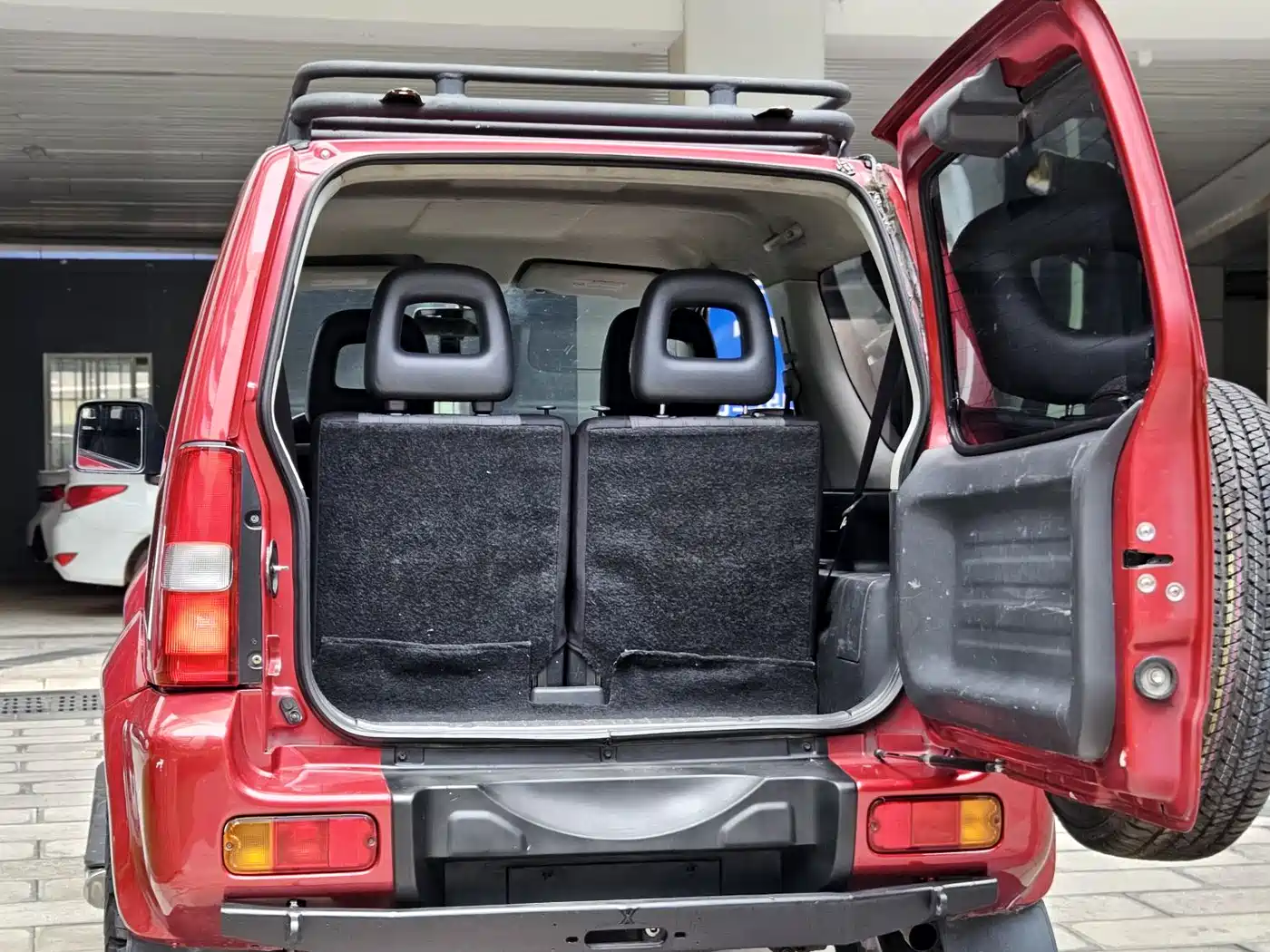 Suzuki Jimny (Import) 2009 1.3 MT Fashion фото 18