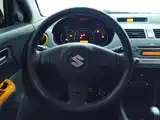 Фото 15 - Suzuki Swift