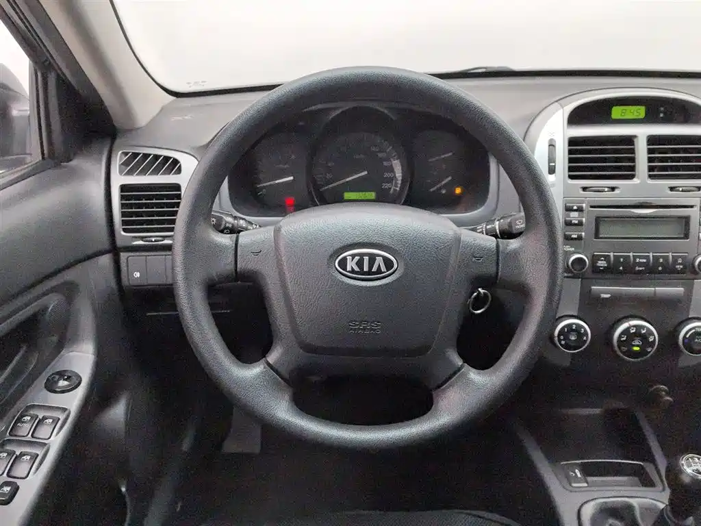 Kia Cerato 2012 1.6L MT GL фото 11