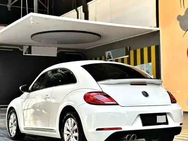 Volkswagen Beetle 2014 1.2TSI Comfort Edition фото 3