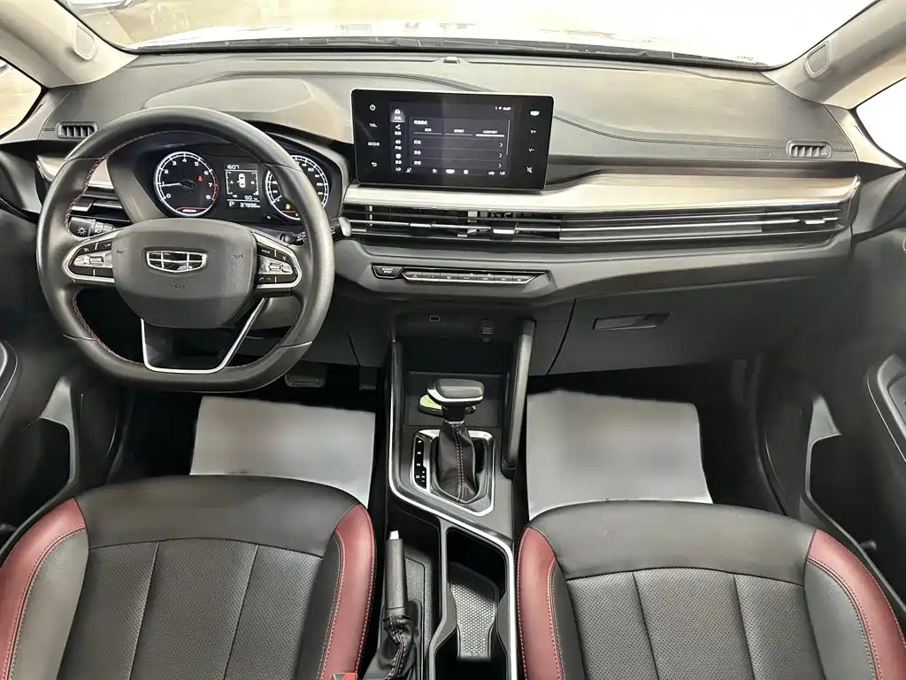 Фото 12 - Geely Vision X3