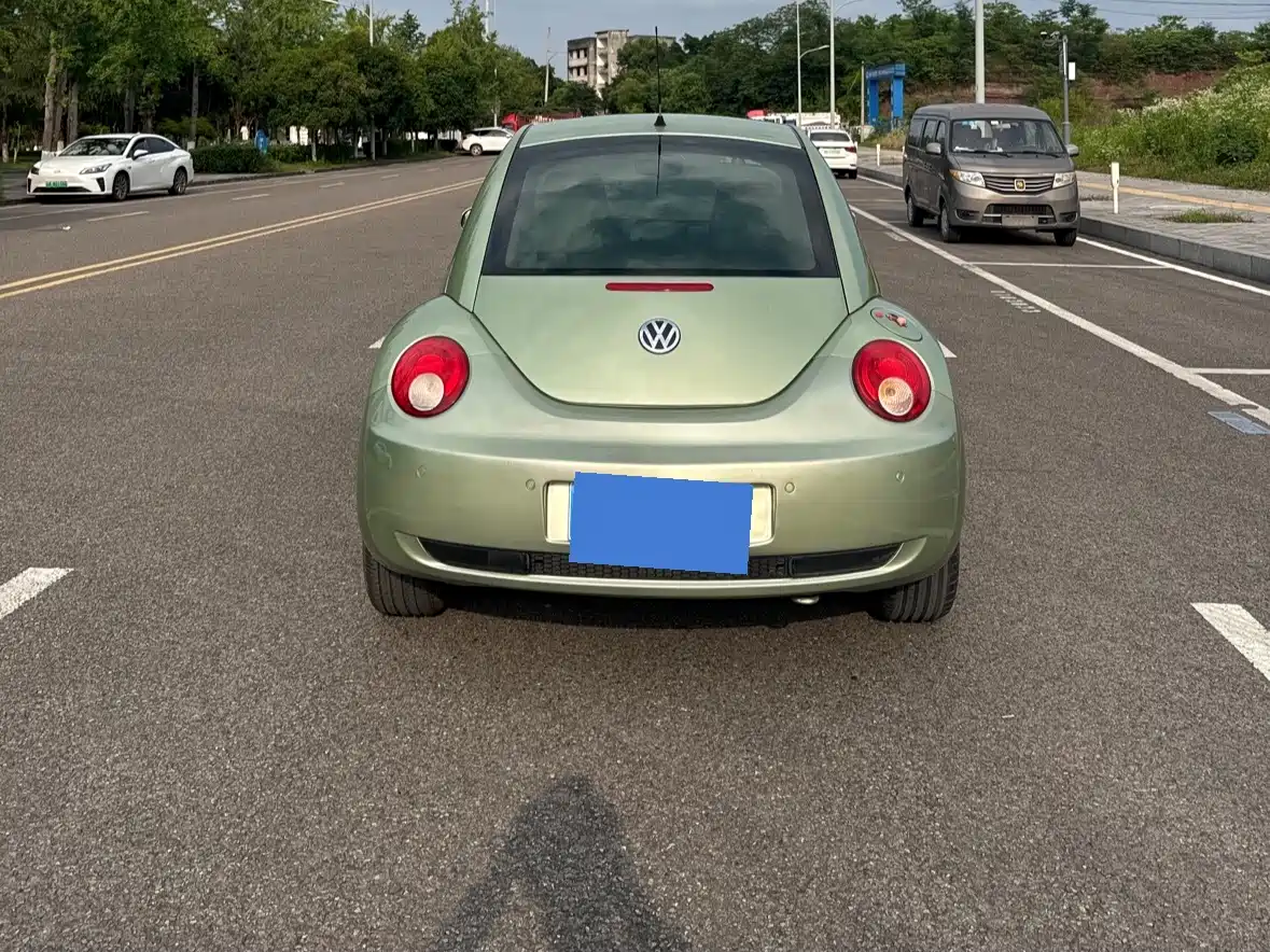 Volkswagen Beetle 2010 Model 2.0 BlackOrange Luxury Edition фото 5