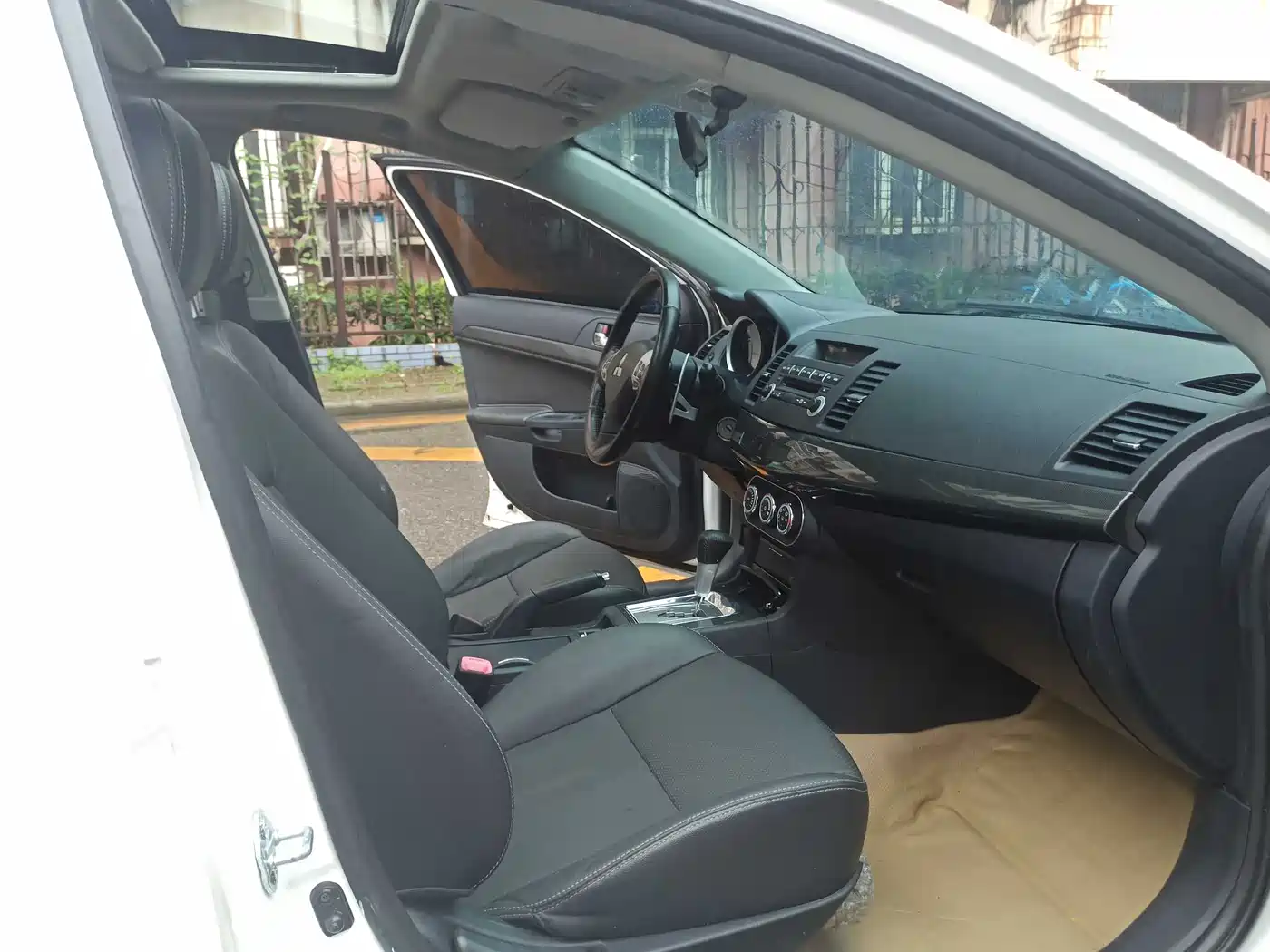 Mitsubishi Lancer EX 2013 ZhiShang Edition 1.8L CVT Luxury фото 7