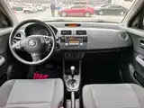 Фото 11 - Suzuki Swift
