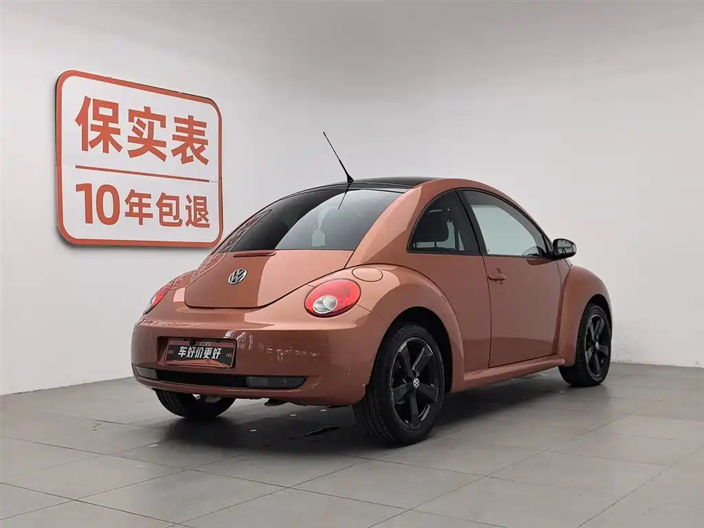 Volkswagen Beetle 2010 1.8T BlackOrange Luxury Edition фото 2