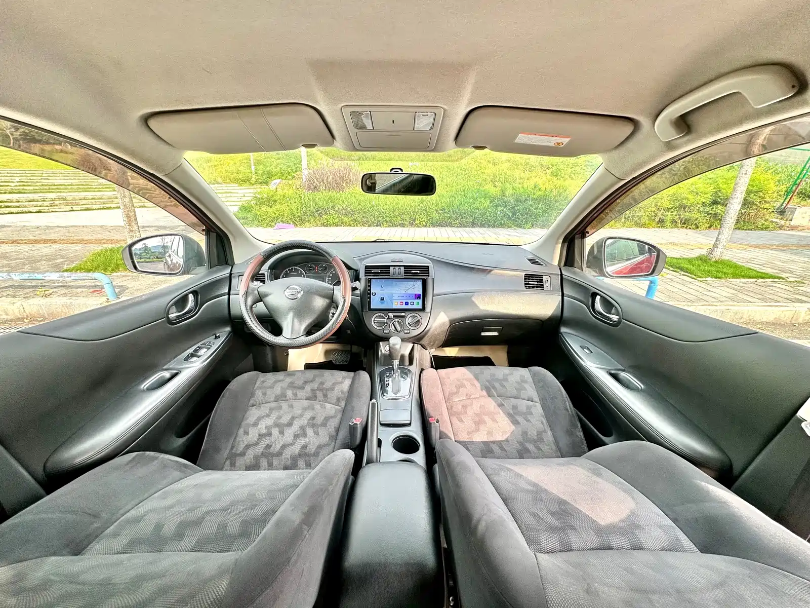 Фото 33 - Nissan Tiida