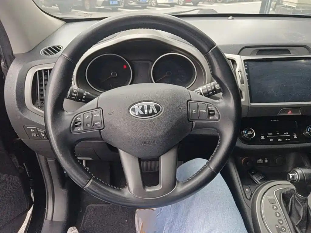 Фото 11 - Kia Sportage