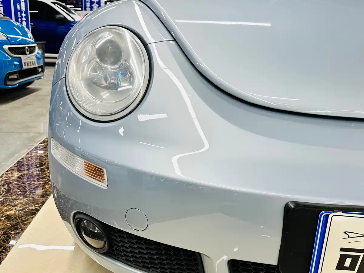 Volkswagen Beetle 2010 1.8T BlackOrange Luxury Edition фото 8