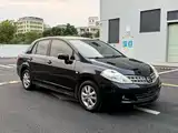 Фото 3 - Nissan Tiida