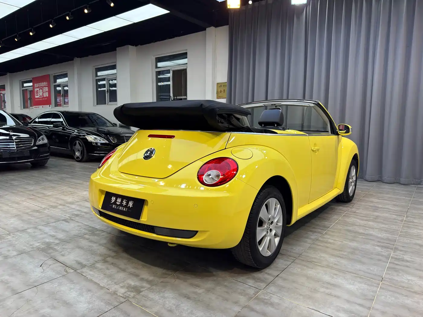 Volkswagen Beetle 2009 2.0 AT Top Convertible фото 6