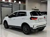 Фото 20 - Geely Vision X3
